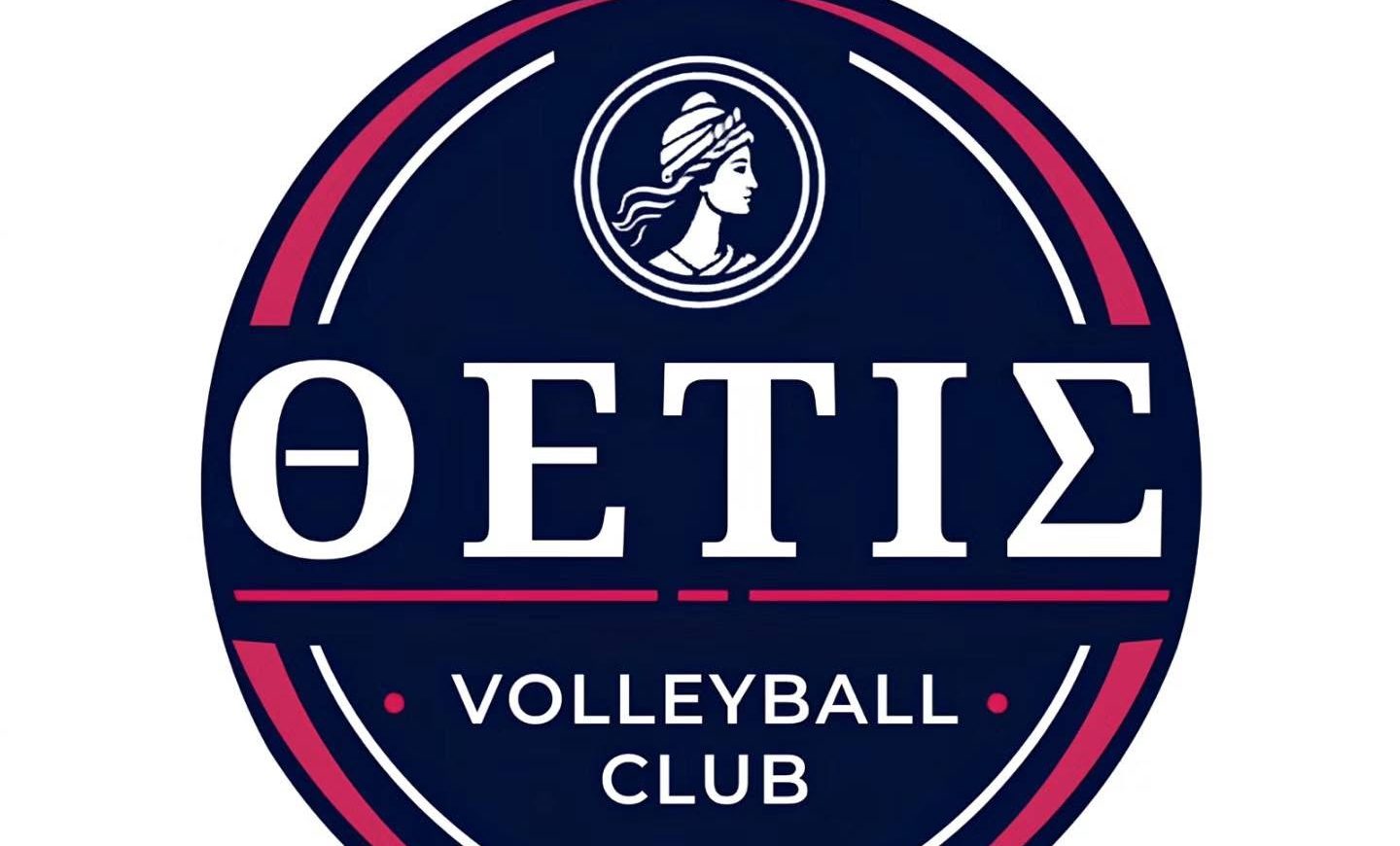 8195659021516178397205121604161434591170262n The Volley Lovers Circular logo for ΘΕΤΙΣ Volleyball Club featuring white Greek letters on a navy background, a small profile silhouette in a circle at the top, and pink accent stripes.