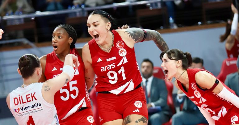 83645930910734828453114435850993270920729455n The Volley Lovers Female volleyball players in red uniforms celebrate together on court, arms raised in victory.